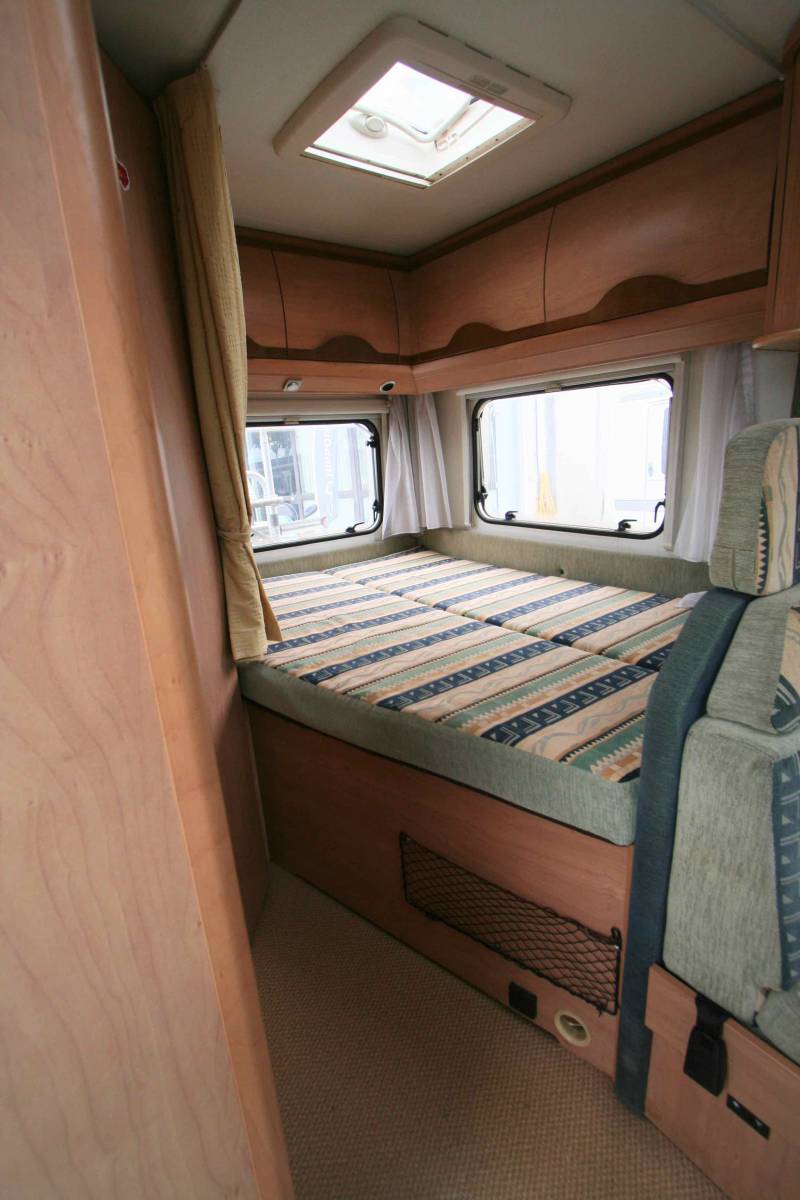 Camping-car profilé occasion, moins de 6 m, 4 places, Bürstner T 595 Privilège, à Roques près Toulouse 31