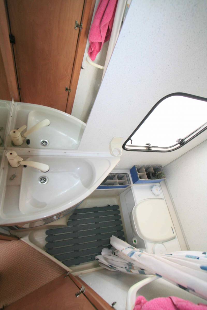 Camping-car profilé occasion, moins de 6 m, 4 places, Bürstner T 595 Privilège, à Roques près Toulouse 31