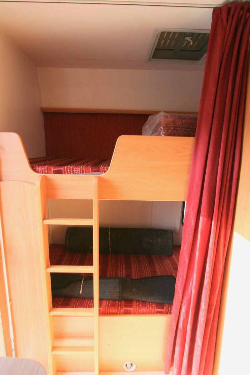 Camping-car capucine occasion, petit prix, lits superposés, 7 m, double dînette, 7 couchages, 5 places carte grise, Chausson Flash 05, à Roques proche de Toulouse (31)