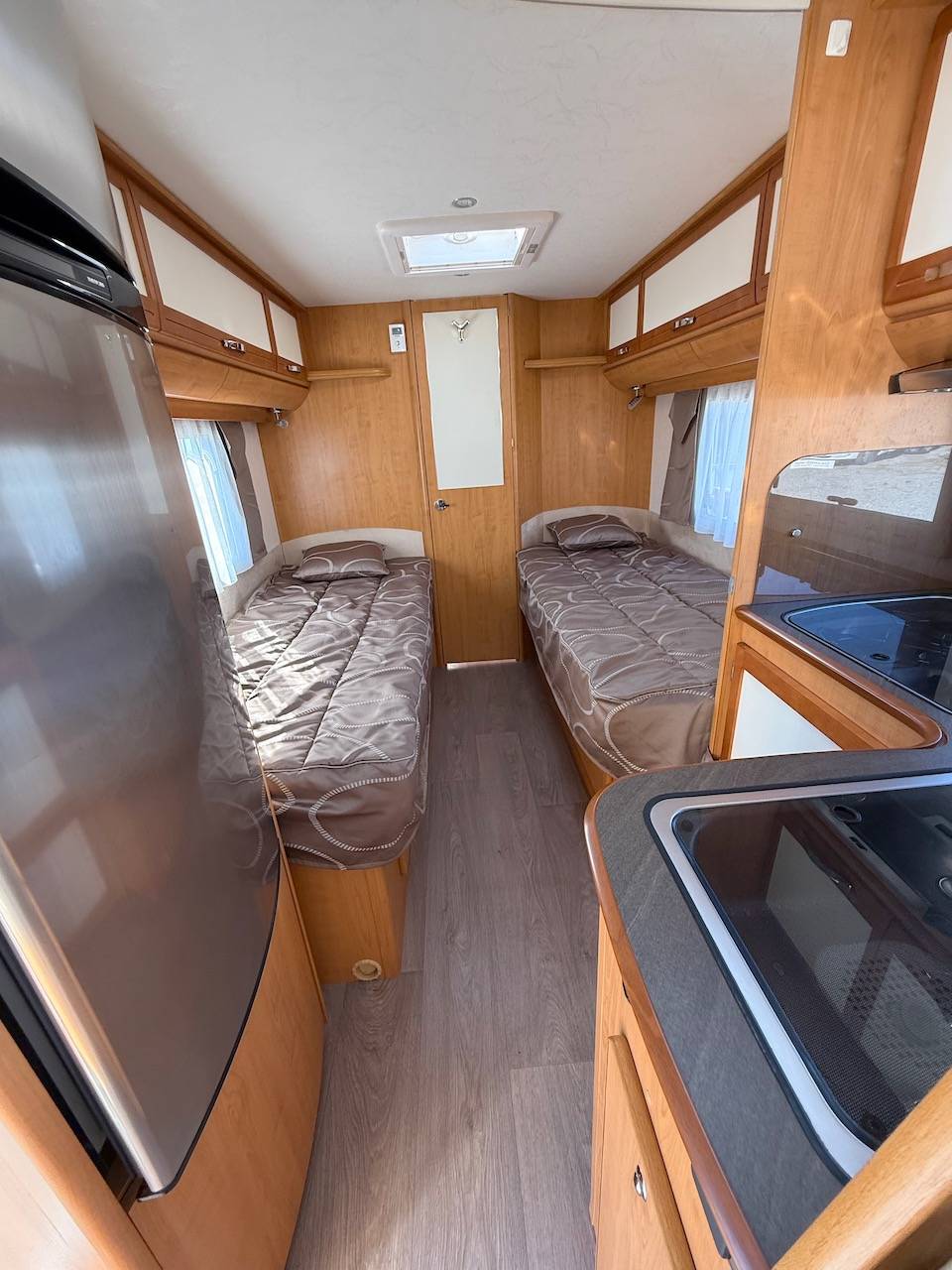 À vendre un nouveau camping-car occasion profilé, lits jumeaux, boîte automatique, 4 places, 4 couchages, Fleurette Migrateur 73 LJ, à Roques, proche de Toulouse (31)