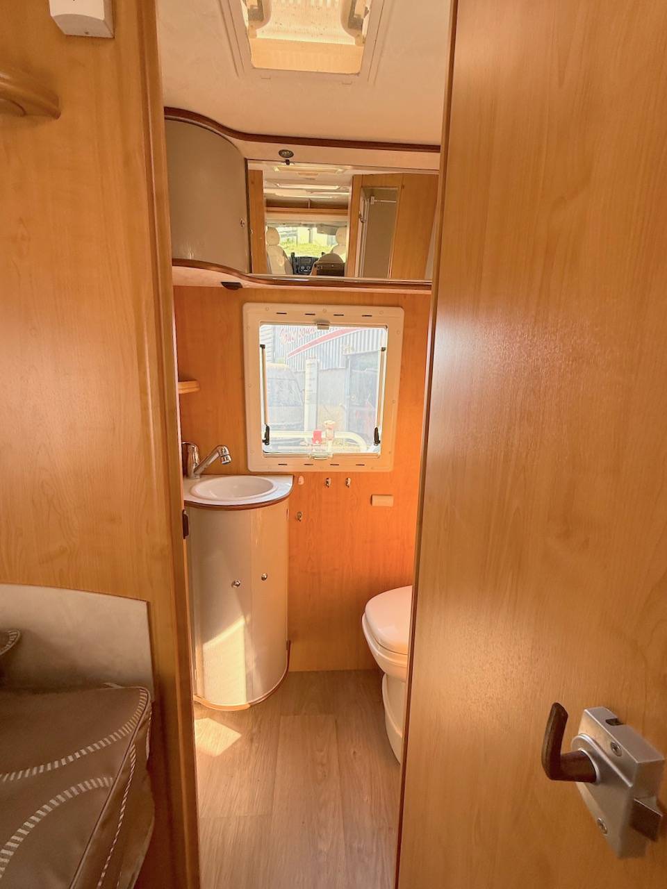 Camping-car occasion profilé, lits jumeaux, boîte automatique, 4 places, 4 couchages, Fleurette Migrateur 73 LJ, à Roques, proche de Toulouse (31)