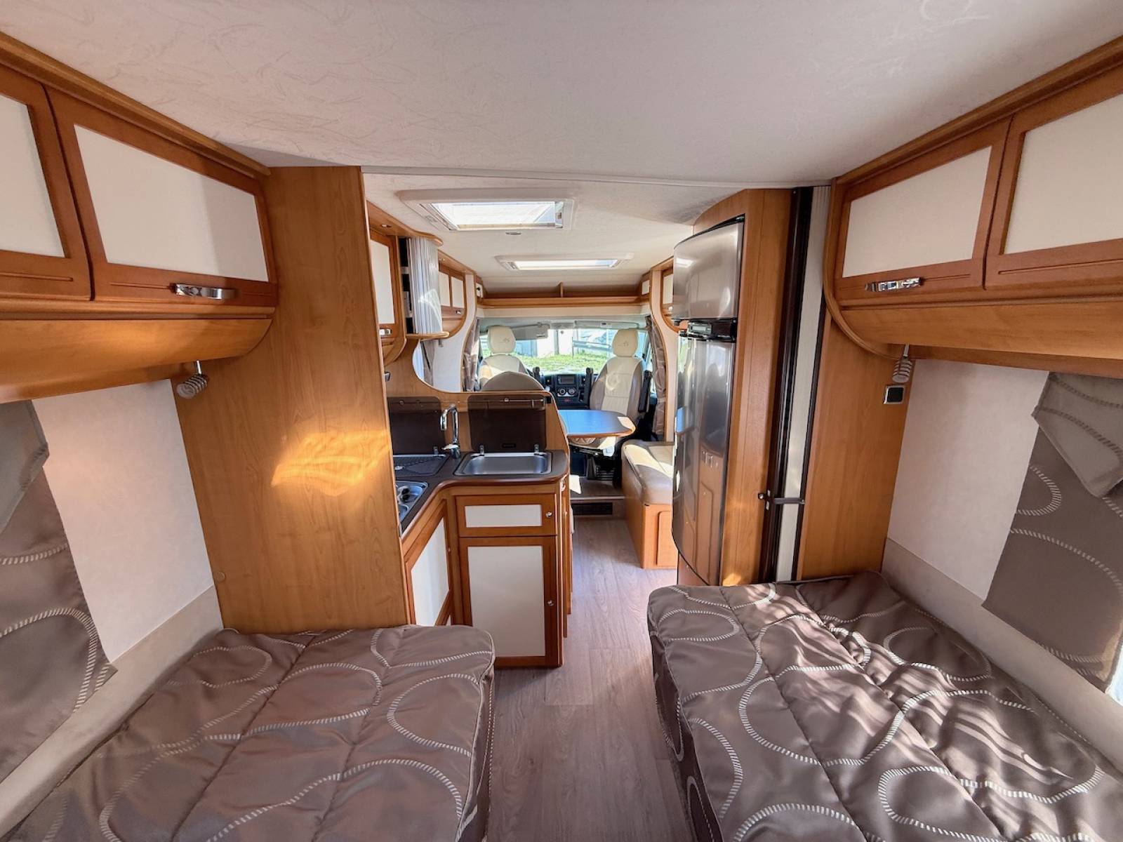 Camping-car occasion profilé, lits jumeaux, boîte automatique, 4 places, 4 couchages, Fleurette Migrateur 73 LJ, à Roques, proche de Toulouse (31)