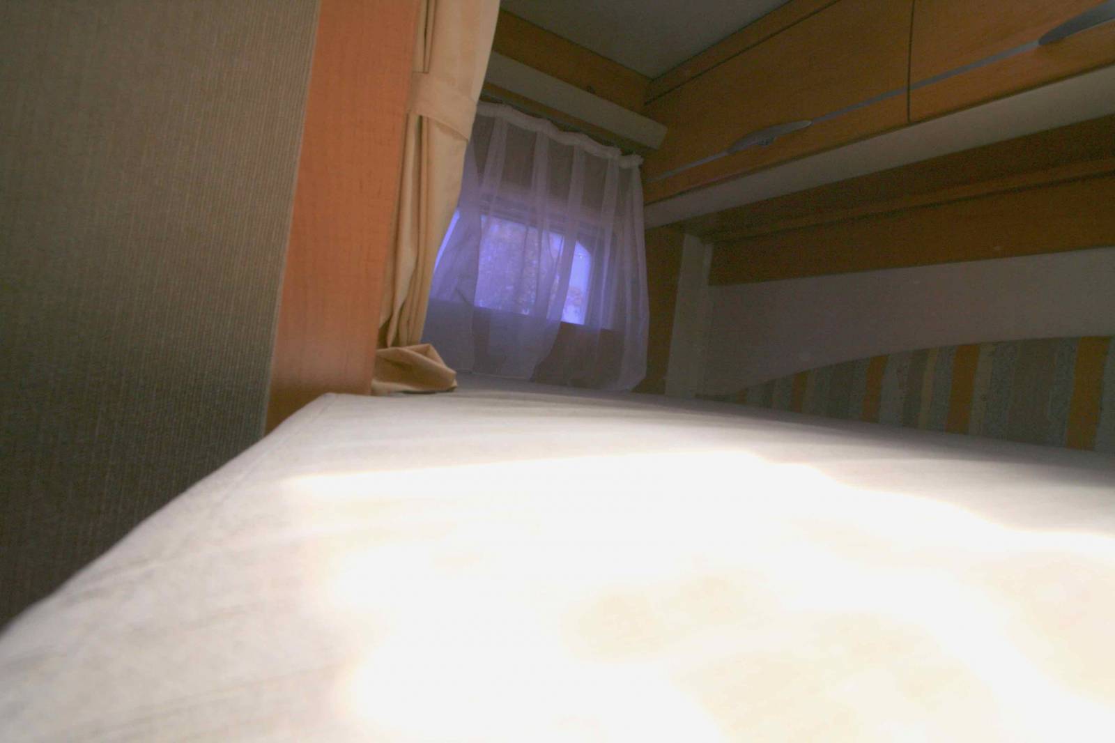 Camping-car occasion intégral Hymermobil 664 BC, 4 places, lit sur grande soute, à roques proche de Toulouse (31)