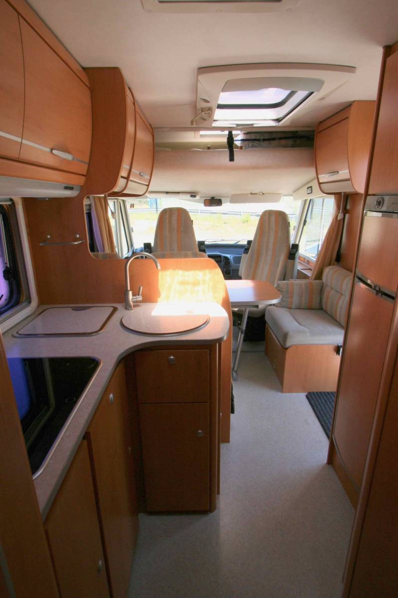 Camping-car occasion intégral Hymermobil 664 BC, 4 places, lit sur grande soute, à roques proche de Toulouse (31)