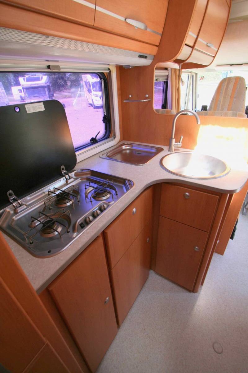 Achat Camping-car occasion intégral Hymermobil 664 BC, 4 places, lit sur grande soute, à roques proche de Toulouse (31)