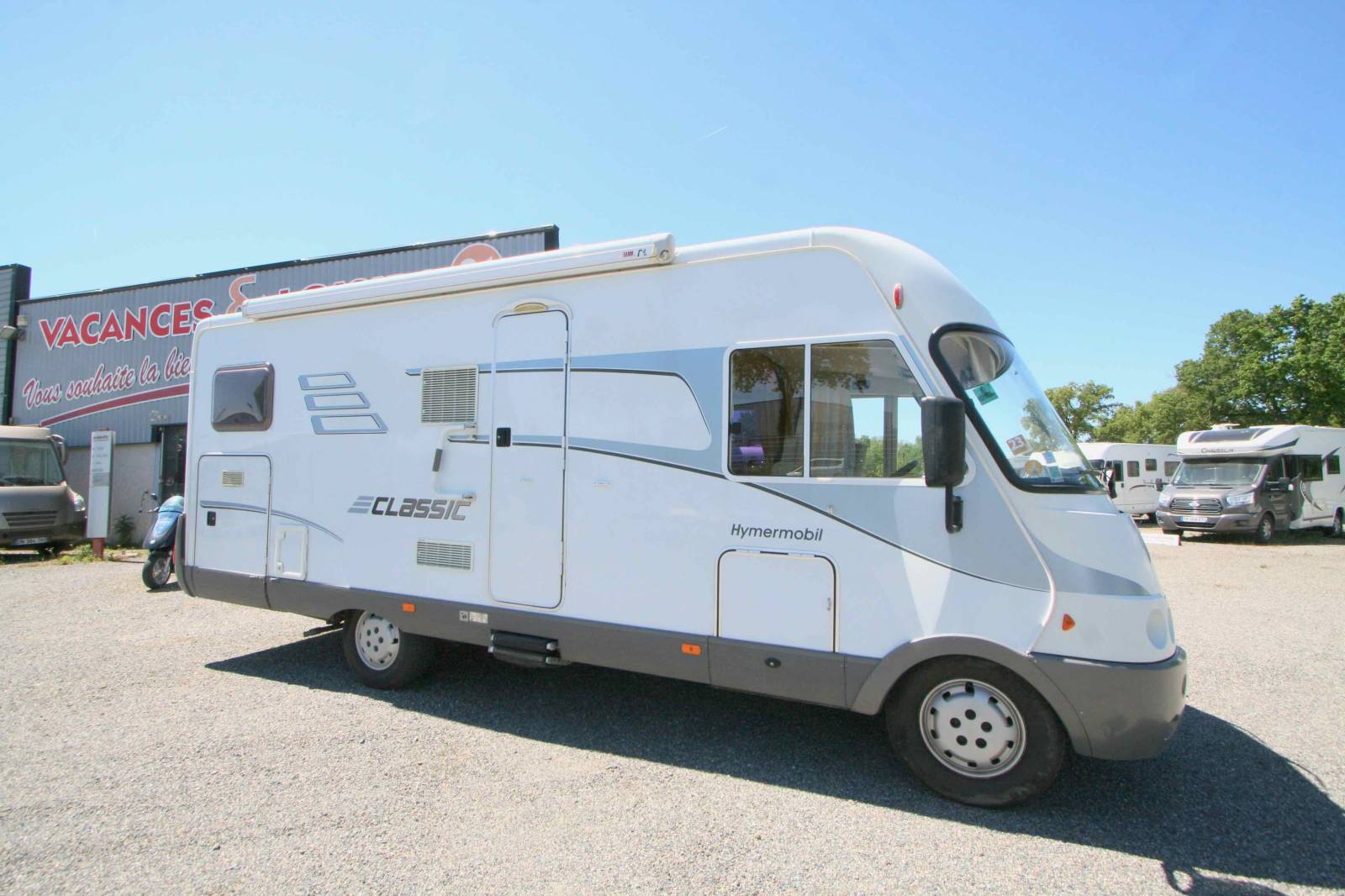 Camping-car occasion intégral Hymermobil 664 BC, 4 places, lit sur grande soute, à roques proche de Toulouse (31)