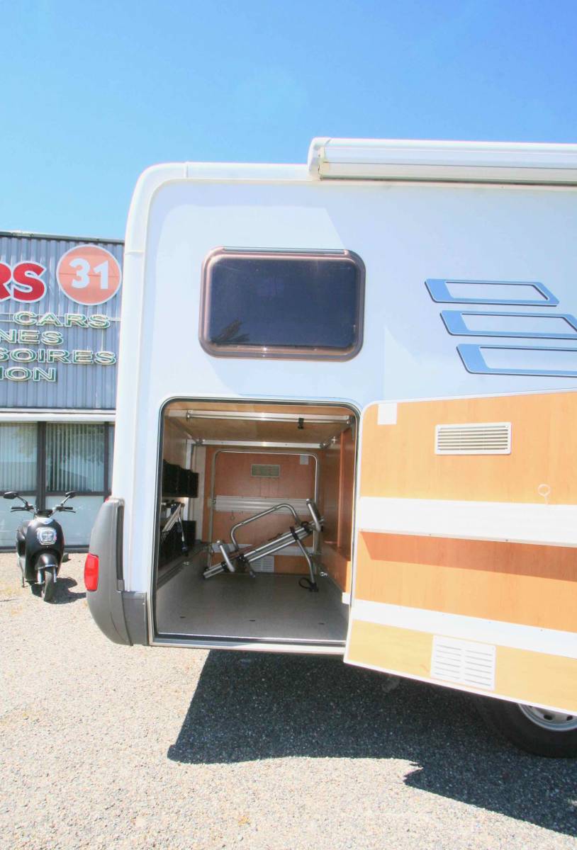 Vend Camping-car occasion intégral Hymermobil 664 BC, 4 places, lit sur grande soute, à roques proche de Toulouse (31)