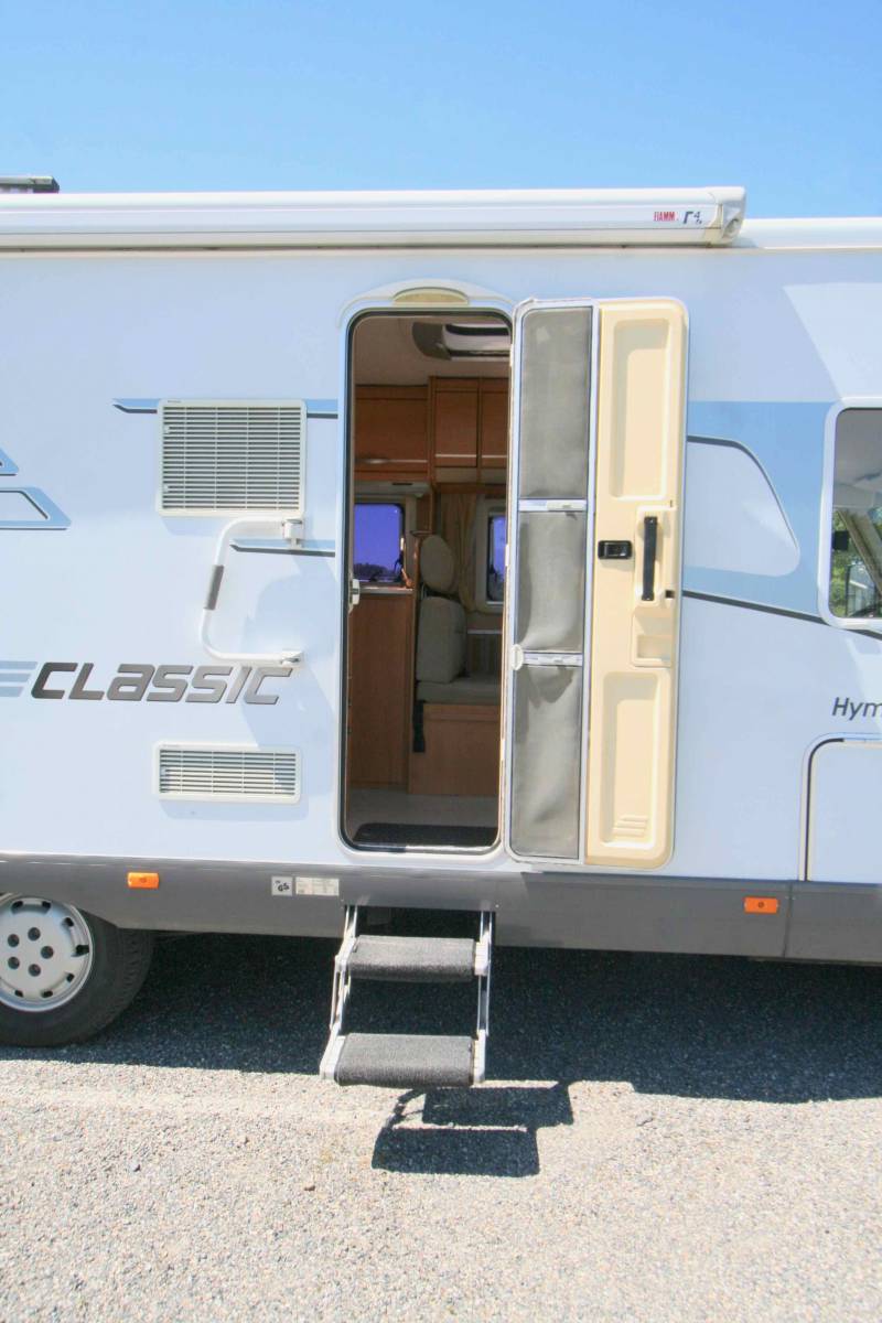 Camping-car occasion intégral Hymermobil 664 BC, 4 places, lit sur grande soute, à roques proche de Toulouse (31)