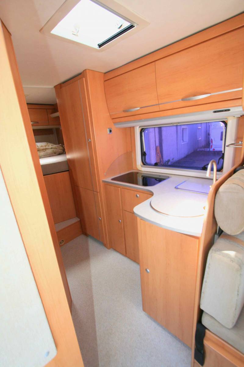 Achat Camping-car occasion intégral Hymermobil 664 BC, 4 places, lit sur grande soute, à roques proche de Toulouse (31)