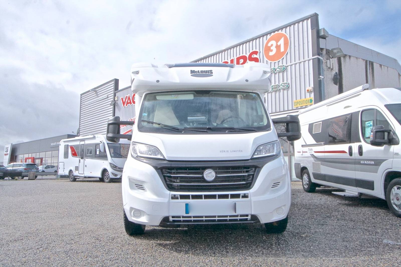 Vente Achat Camping-car profilé occasion, 5 couchages, lit de milieu, Mc Louis Yearling 77G, à Toulouse (31)