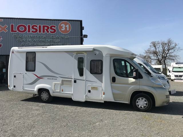 Camping-car profilé d’occasion, lit de milieu, 3 places, Fleurette Magister 73 LMS, à Roques proche de Toulouse 31