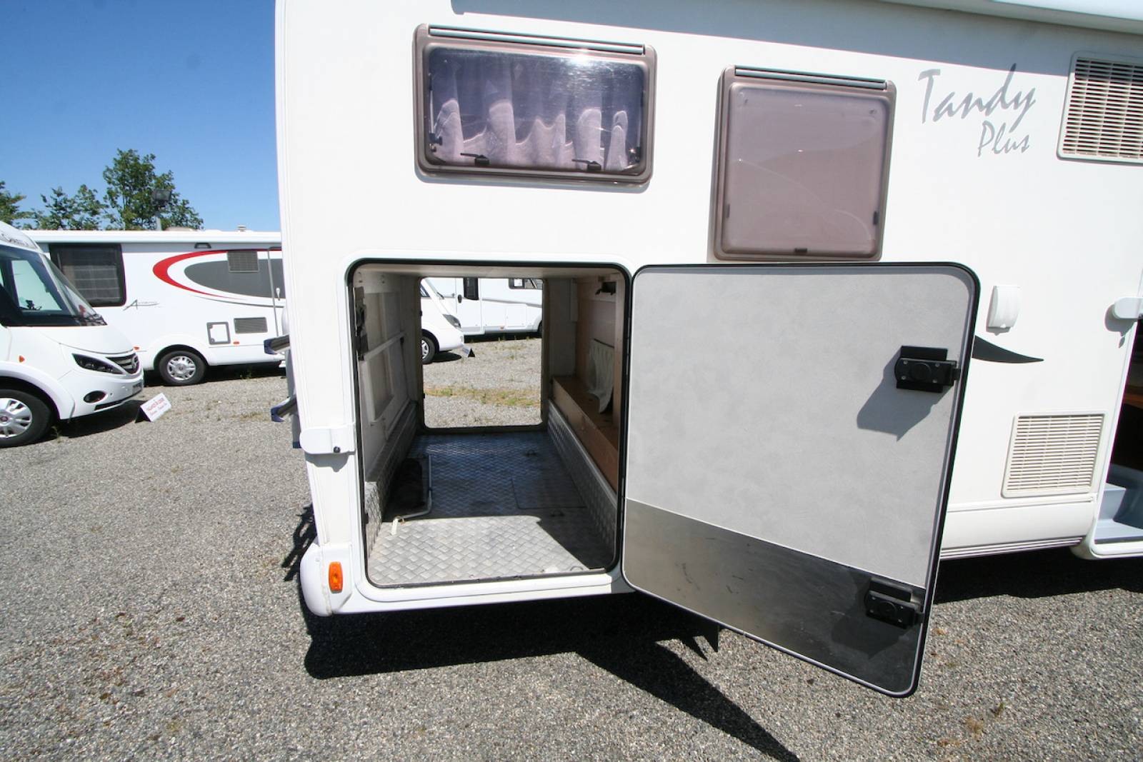 Camping-car profilé occasion, lit sur soute, 5 places carte grise, 4 couchages, Mc Louis Tandy 670 G, à Roques, proche de Toulouse (31)