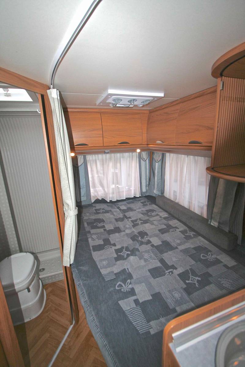 Camping-car occasion profilé, lit à la française, salon face à face, moins de 7 m, Bürstner Privilège T630, à Roques proche de Toulouse 31