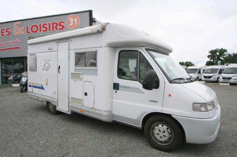 Camping-car profilé occasion, moins de 6 m, 4 places, Bürstner T 595 Privilège, à Roques près Toulouse 31