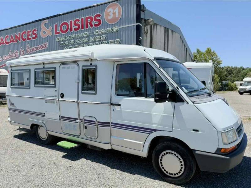 Camping-car profilé occasion, salon arrière en U, moins de 6 m, 4 places, petit prix, Eriba car 580, à Roques proche de Toulouse (31)