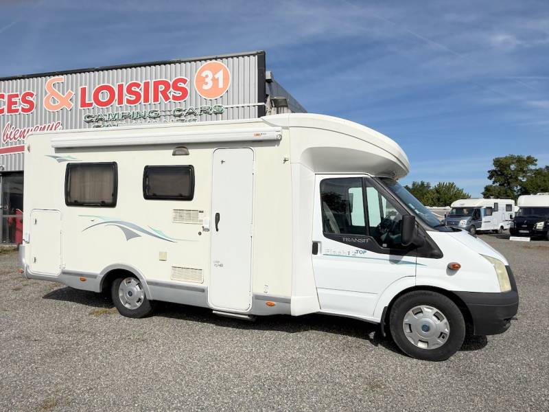 Camping-car profilé occasion, lit central, 3 places, petit prix, moins de 7 m, Chausson Flash 12 top, à Roques proche de Toulouse (31)