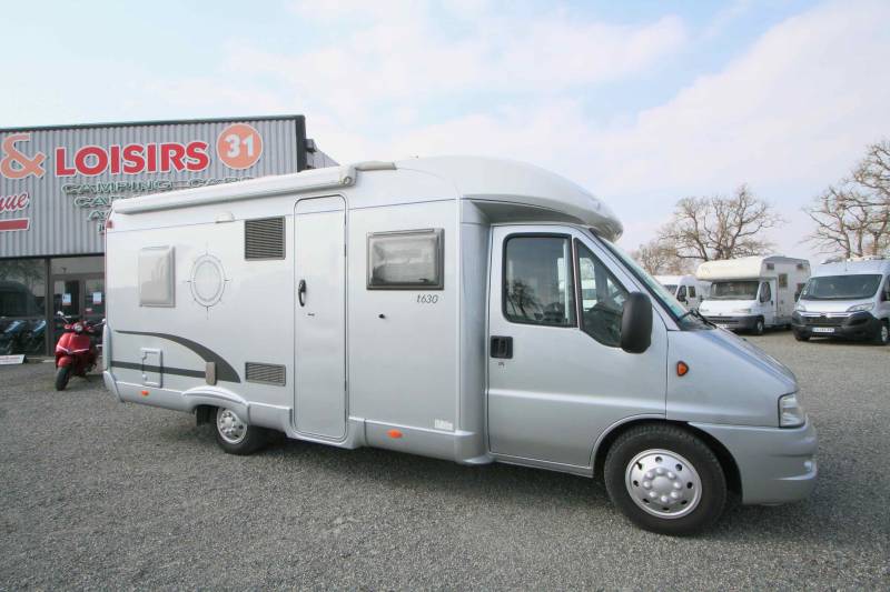 Camping-car occasion profilé, lit à la française, salon face à face, moins de 7 m, Bürstner Privilège T630, à Roques proche de Toulouse 31