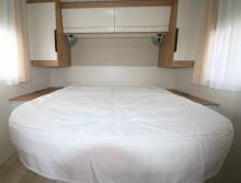 Camping-car profilé occasion, lit central, lit de pavillon,  salon face à face, climatisation moteur et cellule, Bavaria T746 Fc, chez Vacances et Loisirs spécialiste du camping-car d'occasion, à Roques proche de Toulouse (31)é