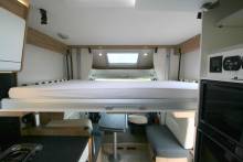 Camping-car profilé occasion, lit central, lit de pavillon,  salon face à face, climatisation moteur et cellule, Bavaria T746 Fc, chez Vacances et Loisirs spécialiste du camping-car d'occasion, à Roques proche de Toulouse (31)é