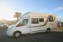 Camping-car profilé d'occasion, lit central, lit de pavillon, 5 couchages, Benimar Tessoro 495, à Roques proche de Toulouse (31)