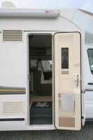 Camping-car profilé d'occasion, lit central, lit de pavillon, 5 couchages, Benimar Tessoro 495, à Roques proche de Toulouse (31)