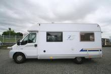 Camping-car profilé occasion, moins de 6 m, 4 places, Bürstner T 595 Privilège, à Roques près Toulouse 31