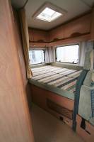 Camping-car profilé occasion, moins de 6 m, 4 places, Bürstner T 595 Privilège, à Roques près Toulouse 31