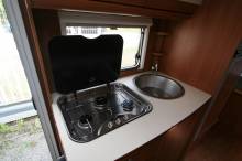 Camping-car profilé d’occasion, lit central, climatisation cellule, 4 places, 3 couchages, Capron Carado Mobil T 449, à Roques sur Garonne proche de Toulouse (31)