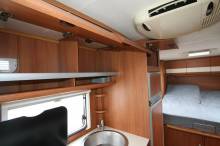 Camping-car profilé d’occasion, lit central, climatisation cellule, 4 places, 3 couchages, Capron Carado Mobil T 449, à Roques sur Garonne proche de Toulouse (31)