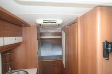 Camping-car profilé d’occasion, lit central, climatisation cellule, 4 places, 3 couchages, Capron Carado Mobil T 449, à Roques sur Garonne proche de Toulouse (31)