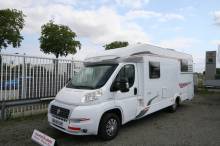 Camping-car profilé d’occasion, lit central, climatisation cellule, 4 places, 3 couchages, Capron Carado Mobil T 449, à Roques sur Garonne proche de Toulouse (31)