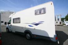 Camping-car profilé occasion, lit sur grande soute, 4 couchages, Challenger Genesis 40, à Roques, proche Toulouse (31)