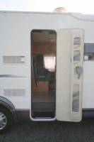 Camping-car profilé occasion, lit sur grande soute, 4 couchages, Challenger Genesis 40, à Roques, proche Toulouse (31)