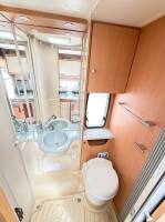 Camping-car profilé occasion compact, lits jumeaux, 4 places, 3 couchages, lit de pavillon 1 place, Chausson flash 16, à Roques proche de Toulouse (31).