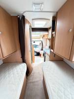 Camping-car profilé occasion compact, lits jumeaux, 4 places, 3 couchages, lit de pavillon 1 place, Chausson flash 16, à Roques proche de Toulouse (31).