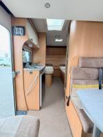 Vend Camping-car profilé occasion compact, lits jumeaux, 4 places, 3 couchages, lit de pavillon 1 place, Chausson flash 16, à Roques proche de Toulouse (31).