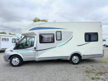 Camping-car profilé occasion compact, lits jumeaux, 4 places, 3 couchages, lit de pavillon 1 place, Chausson flash 16, à Roques proche de Toulouse (31).