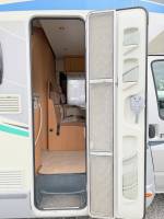 Camping-car profilé occasion compact, lits jumeaux, 4 places, 3 couchages, lit de pavillon 1 place, Chausson flash 16, à Roques proche de Toulouse (31).