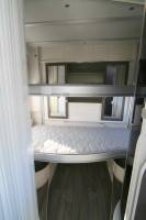 Achat Camping-car profilé occasion, 5 places, 6 couchages, lits superposés et lit de pavillon, Chausson Flash 716 à Roques proche de Toulouse (31)