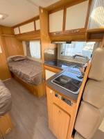 Camping-car occasion profilé, lits jumeaux, boîte automatique, 4 places, 4 couchages, Fleurette Migrateur 73 LJ, à Roques, proche de Toulouse (31)