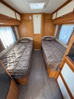 Achat Camping-car occasion profilé, lits jumeaux, boîte automatique, 4 places, 4 couchages, Fleurette Migrateur 73 LJ, à Roques, proche de Toulouse (31)