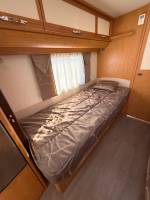 À vendre un nouveau camping-car occasion profilé, lits jumeaux, boîte automatique, 4 places, 4 couchages, Fleurette Migrateur 73 LJ, à Roques, proche de Toulouse (31)
