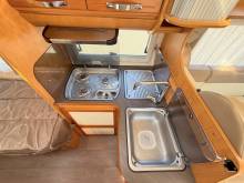 Vente Camping-car occasion profilé, lits jumeaux, boîte automatique, 4 places, 4 couchages, Fleurette Migrateur 73 LJ, à Roques, proche de Toulouse (31)