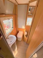 Achat Camping-car occasion profilé, lits jumeaux, boîte automatique, 4 places, 4 couchages, Fleurette Migrateur 73 LJ, à Roques, proche de Toulouse (31)