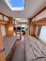 Achat Camping-car occasion profilé, lits jumeaux, boîte automatique, 4 places, 4 couchages, Fleurette Migrateur 73 LJ, à Roques, proche de Toulouse (31)