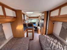 Camping-car occasion profilé, lits jumeaux, boîte automatique, 4 places, 4 couchages, Fleurette Migrateur 73 LJ, à Roques, proche de Toulouse (31)