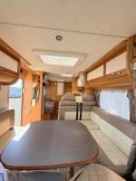 Achat Camping-car occasion profilé, lits jumeaux, boîte automatique, 4 places, 4 couchages, Fleurette Migrateur 73 LJ, à Roques, proche de Toulouse (31)