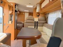 À vendre un nouveau camping-car occasion profilé, lits jumeaux, boîte automatique, 4 places, 4 couchages, Fleurette Migrateur 73 LJ, à Roques, proche de Toulouse (31)2