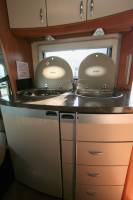 Achat Camping-car capucine occasion, lit à la française, 4 places, Hobby Siesta 555, à Roques proche Toulouse (31)