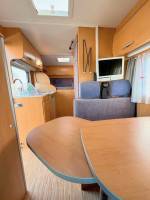 Camping-car Profilé Occasion, lit sur soute, pour deux, moins de 7 m, la taille d'un fourgon, petit prix, Hymer Van 522, chez Vacances et loisirs, spécialiste du camping-car d'occasion à Roques, proche de Toulouse (31)